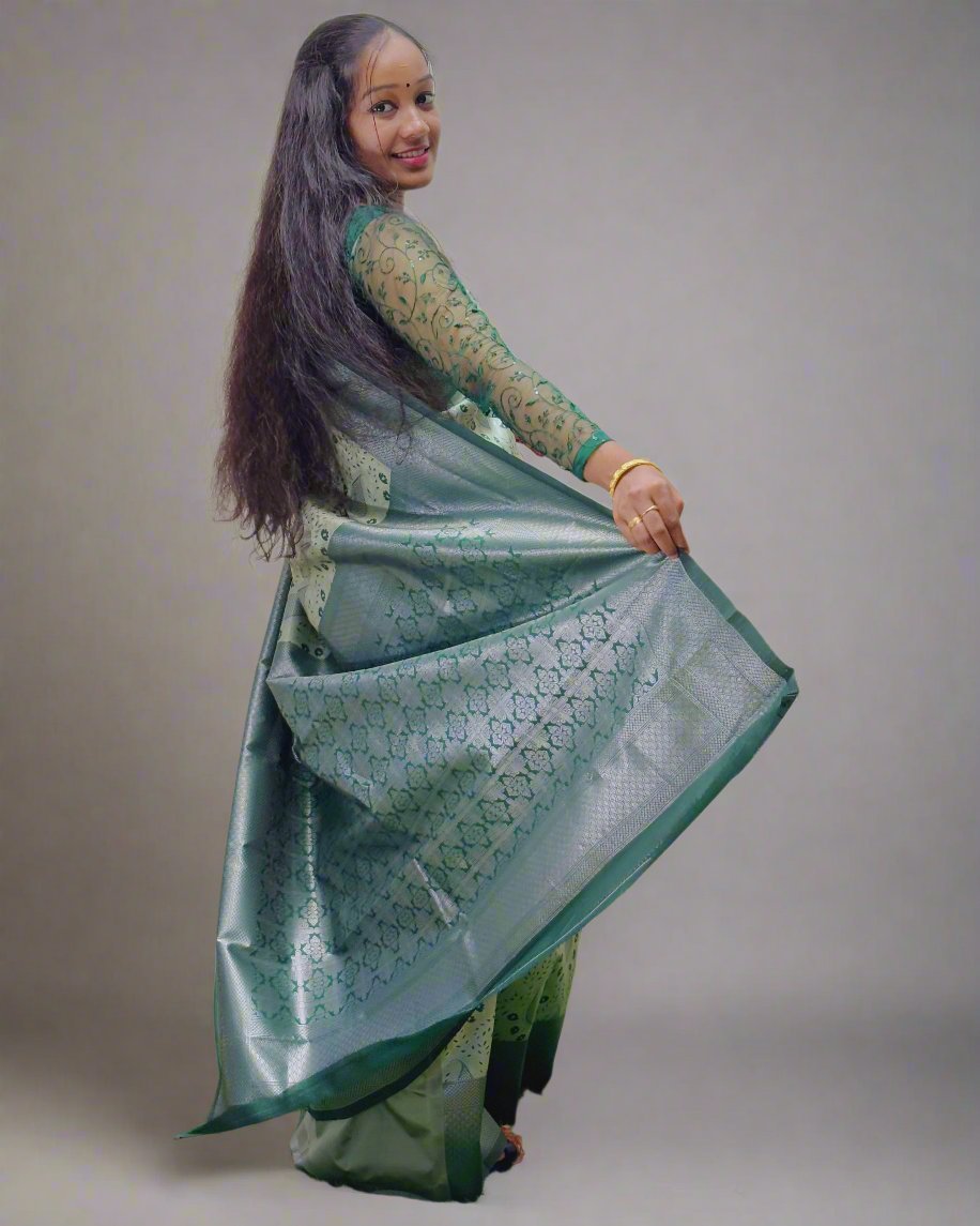 Handloom Green Silk Saree with Floral Motifs Product Description: